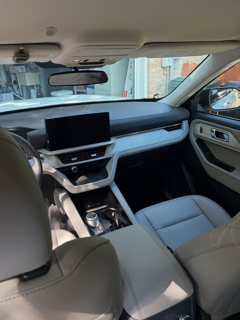 Light grey leather SUV interior after an interior detail